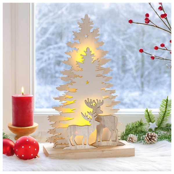 Weihnachtsdeko Rehe vor Baumsilhouette