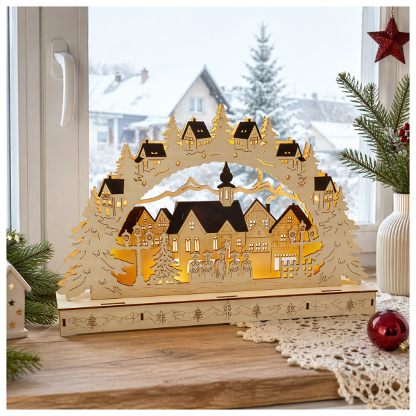 Lichterbogen Sternensinger im Winterdorf